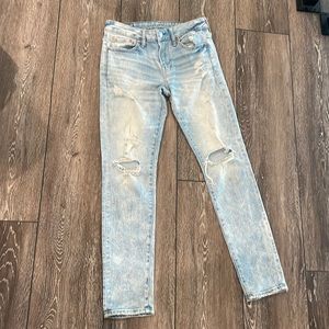 Men’s distressed light wash jeans